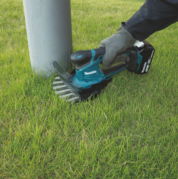 Makita DUM604ZX Batteridriven Kant-/Häcksax 18V  (Utan batterier) - laddare